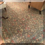 D010. Green floral stark custom rug with border approx 17'11” x 12' - $450